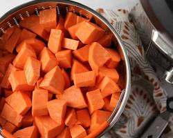 Chopped sweet potatoes in a pot