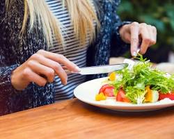 صورة person eating a healthy meal