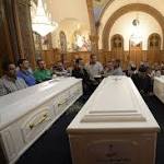 Christians Egypt prepare bury dead