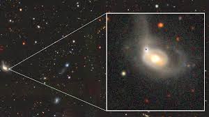 Astronomers discover black hole ripping a star apart inside a galactic collision. ‘It is a peculiar event’