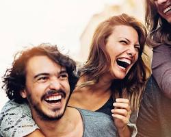 Image of person laughing with their friends