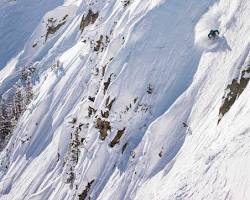 Skiers enjoying the slopes at Yellowstone Club