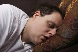 Image result for picture of a man sleeping on a bed