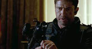Violence ensues and John McClane and his son save the day like Michael Banning did. - Gerard-Butler-in-Olympus-Has-Fallen-2013-Movie-Image-3