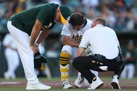 Athletics' 1B Nick Kurtz leaves early after being hit in wrist by pitch in game vs. Red Sox