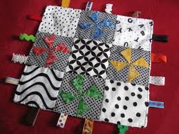 Résultat de recherche d'images pour "taggy blanket"