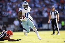 How did Dallas Cowboys running back Ezekiel Elliott fare in the team’s 
season opener?