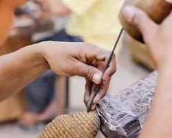 A craftswoman at Artisans Angkor in Siem Reap.