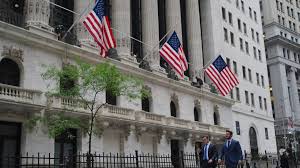 US stocks down at close after Fed's Warsh signals possible rate hike