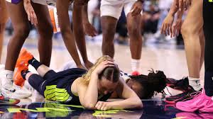 Paige Bueckers Injured in Collision with Nneka Ogwumike, Latest Updates on Wings Star