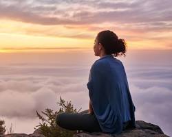 person meditating in a serene setting
