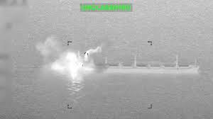 Thermal imagery of a U.S. strike near the stern of a cargo vessel in the Gulf of Oman