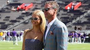Lane Kiffin with daughter Landry Kiffin and LSU linebacker Whit Weeks
