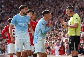 Phil Foden sent off in Manchester derby for wild kick on Bruno Fernandes