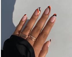 Hình ảnh về Orange Black nail design
