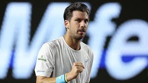 Los Cabos Open: Cameron Norrie reaches semi-finals by beating Bernard Tomic in 50 minutes