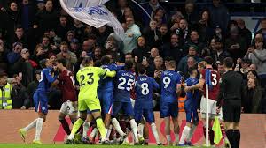 Chaos at Chelsea! Jean-Clair Todibo sent off for grabbing Joao Pedro by the throat as mass brawl breaks out after Blues complete sensational comeback