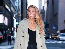Blake Lively Wears a Divisive Millennial Accessory in Rare PDA-Filled Game Day Photos With Ryan Reynolds
