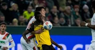أوجسبورج يواجه دورتموند في قمة مثيرة ضمن سباق اللقب الألماني