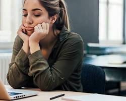 Image of stressedout parent looking at school applications