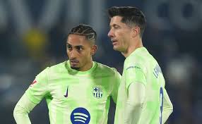 Why are Raphinha and Lewandowski not playing today for Barcelona vs Racing Santander in 2026 Copa del Rey?