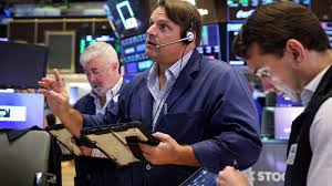 Traders monitor technology stocks and rising bond yields on Wall Street