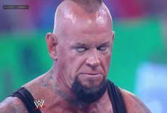 Image result for brock smiles at undertaker