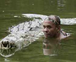 Image result for he swims with crocodile