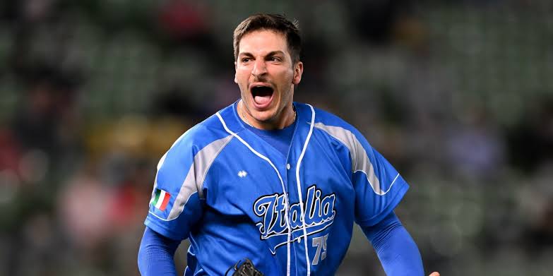 Team Italy's Joe LaSorsa celebrates after strikeouts