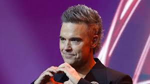 Robbie Williams Shares Rare Family Photo & Addresses Port Vale Takeover Rumours with Phil Taylor