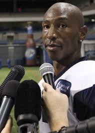 Then Dallas Cowboy Sam Hurd answers questions from the media after morning practice at training camp, July 25, 2010, at the Alamodome. - hurd