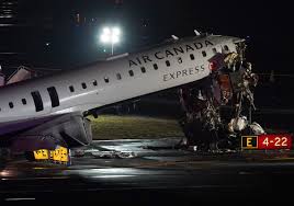 Pilot and copilot killed in collision between jet and fire truck at New York’s LaGuardia Airport