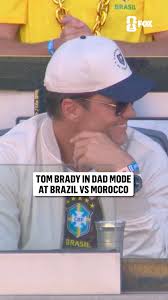 Tom Brady and his daughter Vivian with the elite handshake