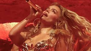 Karol G makes Coachella history as first Latina headliner, shop her Reeboks