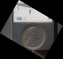 Image result for cutting out the profile of lincoln from a penny