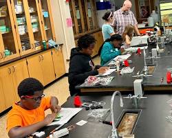 Image of students in a science lab setting