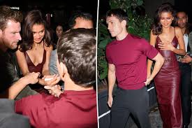 Tom Holland protects girlfriend Zendaya from aggressive paparazzi during 
dinner date