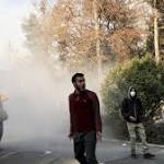 killed Iran protests, Rouhani defiant,