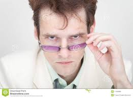Terrible man strictly looks at us over spectacles - terrible-man-strictly-looks-us-over-spectacles-11499899
