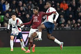 PSG move top with nervy 3-2 win at bottom club Metz