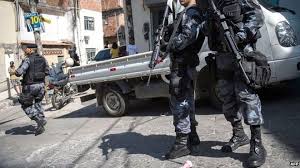 Image result for Amnesty International report slams killings by police in Rio de Janeiro