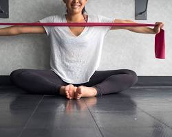 Image of Yoga poses with resistance band