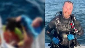 Capitão de barco pula no mar para salvar homem que estava sendo atacado por tubarão