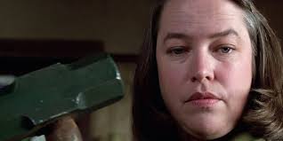 Anne Marie Wilkes Dugan, usually known as Annie Wilkes (Kathy Bates), was the main antagonist of Stephen King&#39;s Misery and its film adaptation. - Annie-Wilkes