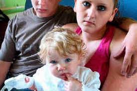 Christopher Cowley and girlfriend Leanne Wood with daughter Ellie Frances Cowley. A YOUNG couple watched in horror as their one year-old daughter was mauled ... - C_71_article_1011801_image_list_image_list_item_0_image