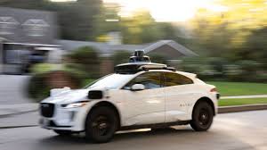 Waymo autonomous robotaxi on a city street