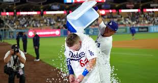 Rushing delivers a dramatic 11th-inning walk-off as Dodgers edge Rockies 8-7