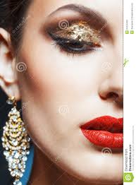 Close-up shot of female face with vogue golden shining eye makeup. MR: YES; PR: NO - golden-eye-makeup-close-up-shot-female-face-vogue-shining-34724483