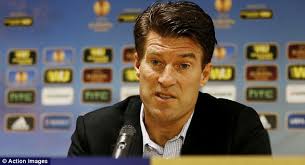 Talking a good game: Michael Laudrup at the Swansea City press conference ahead of their Europa League tie with St Gallen - article-2441754-1877D5D600000578-1_634x343