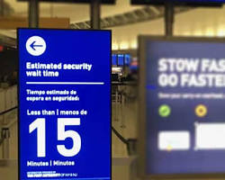 Image of Security checkpoint with wait time display